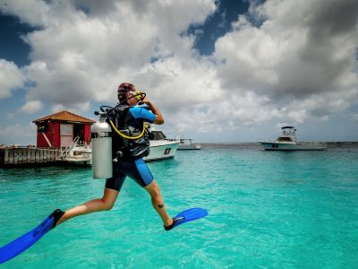 Captain Dons Habitat - Bonaire giant stride from baby dive dock